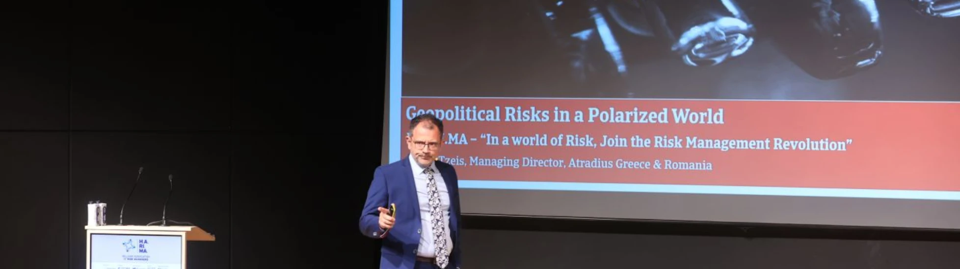 G. Makis speaking at H.A.RI.MA. 2025
